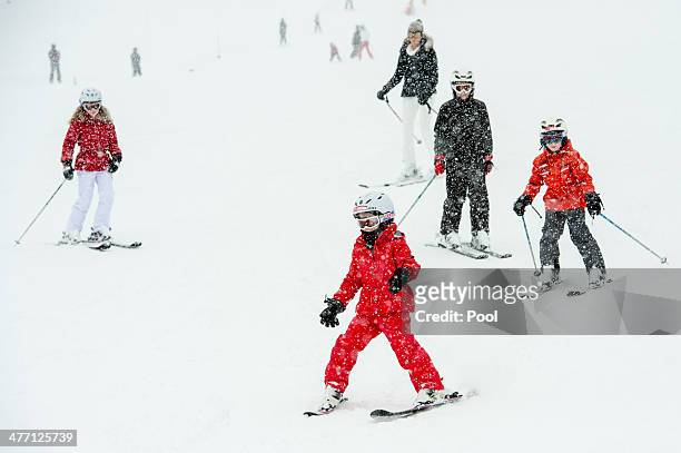 The Royal Famliy of Belgium skies during their winter holidays on March 3, 2014 in Verbier, Switzerland.