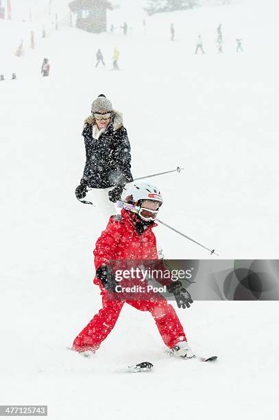 Prince Emmanuel and Queen Mathilde of Belgium ski during their winter holidays on March 3, 2014 in Verbier, Switzerland.