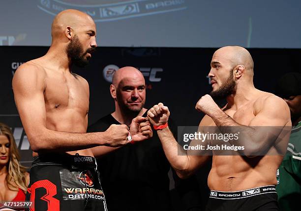 Opponents Cyrille Diabate and Ilir Latifi face off during the UFC weigh-in event at the O2 Arena on March 7, 2014 in London, England.