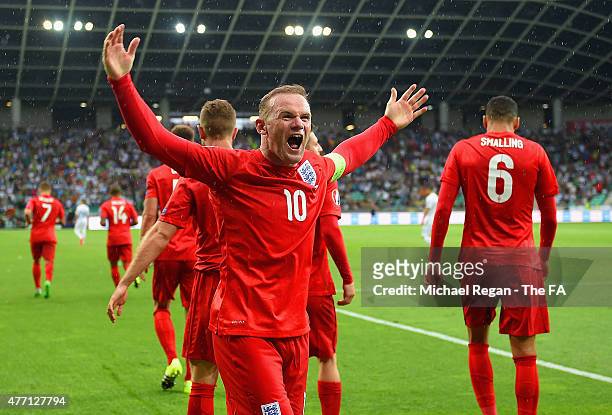 Wayne Rooney of England celebrates scoring their third goal and victory in the UEFA EURO 2016 Qualifier between Slovenia and England on at the...