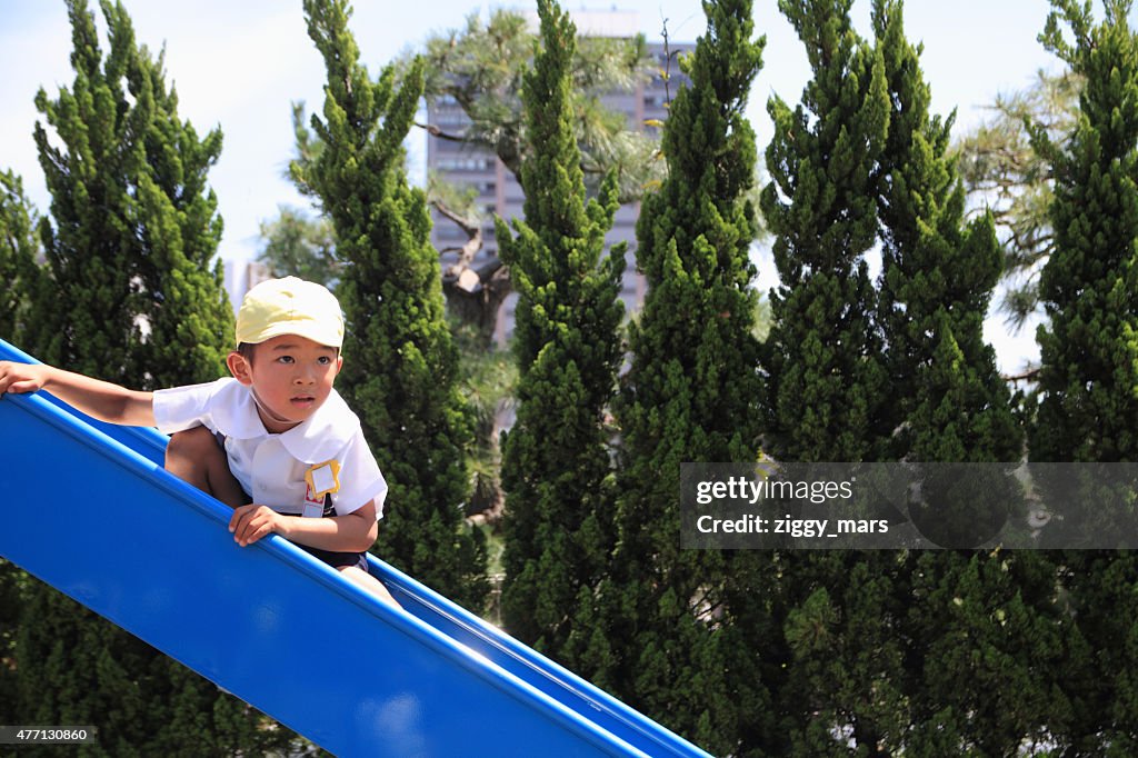Japanese boy on the slide
