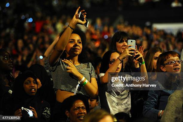 The crowd cheers as Free The Children hosts their debut UK global youth empowerment event, We Day at Wembley Arena on March 7, 2014 in London,...