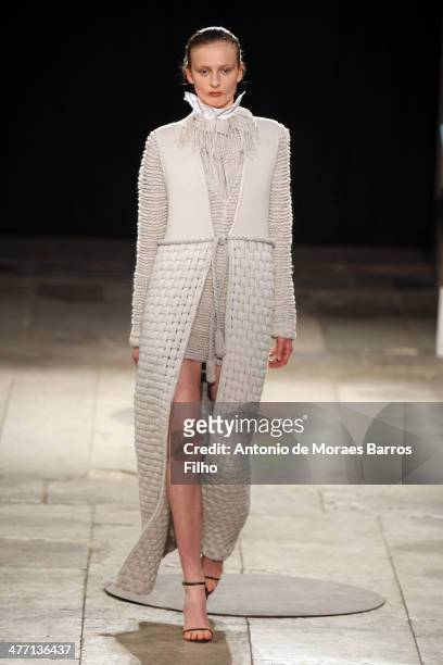 Model walks the runway during the Allude show as part of the Paris Fashion Week Womenswear Fall/Winter 2014-2015 on March 5, 2014 in Paris, France.