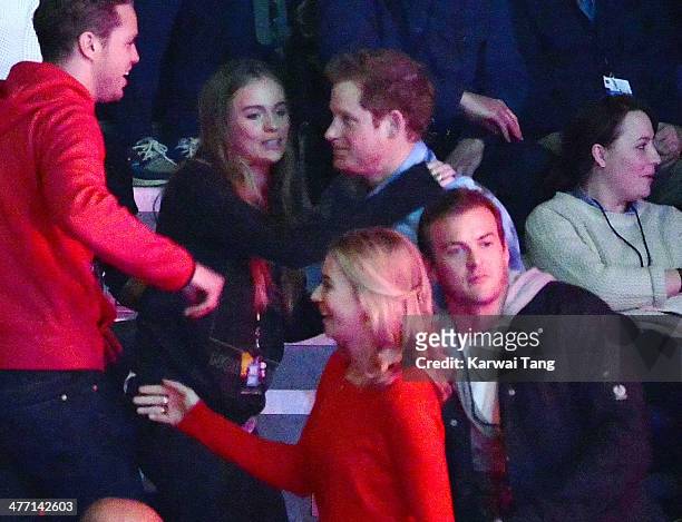 Cressida Bonas and Prince Harry attend We Day UK, a charity event to bring young people together at Wembley Arena on March 7, 2014 in London, England.