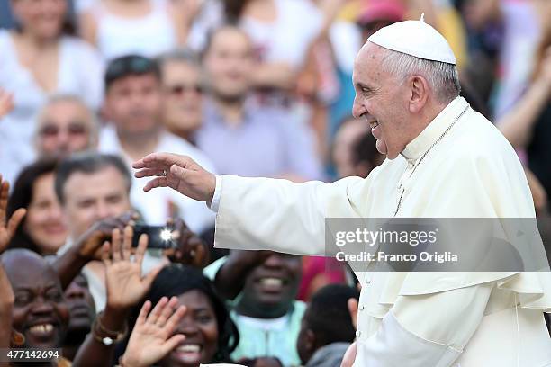 Pope Francis waves to the faithful as he arrives in St. Peter's Square for a meeting with the Roman Diocesans on June 14, 2015 in Vatican City,...