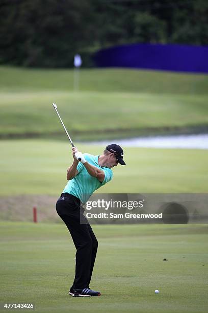 Greg Owen of England hits a shot on the third hole during the final round of the FedEx St. Jude Classic at TPC Southwind on June 14, 2015 in Memphis,...