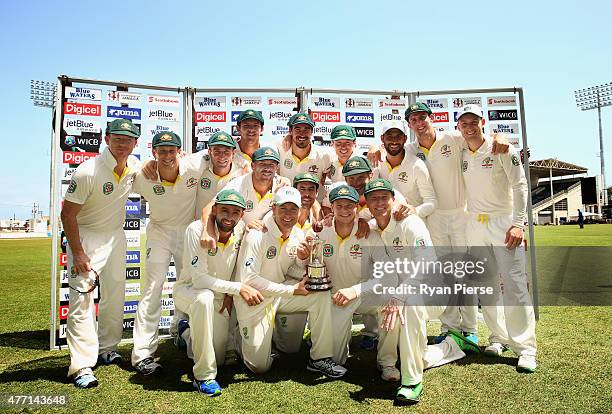 Australia celebrate with the Frank Worrell Trophy during day four of the Second Test match between Australia and the West Indies at Sabina Park on...