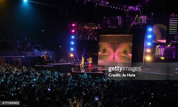 Bloem de Ligny and Sam Ritchie aka Lady Oo of Sam and the Womp perform on stage for We Day UK event at Wembley Arena on March 7, 2014 in London,...