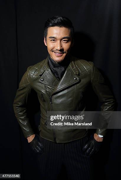 Hu Bing attends the Belstaff show during The London Collections Men SS16 at Old Billingsgate on June 14, 2015 in London, England.