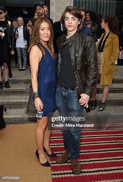 Sascha Bailey and Mimi Nishikawa Bailey attends the Belstaff show during The London Collections Men SS16 at Old Billingsgate on June 14, 2015 in...