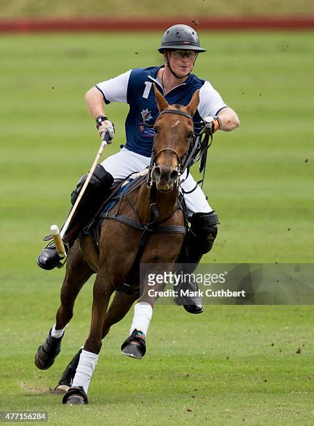 Prince Harry takes part in the Gigaset Charity Polo Match at Beaufort Polo Club on June 14, 2015 in Tetbury, England.