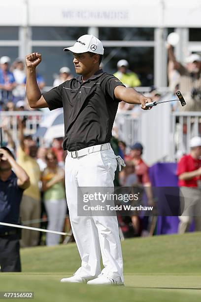 Fabian Gomez of Argentina celebrates after a birdie putt on the 18th hole to win the FedEx St. Jude Classic at TPC Southwind on June 14, 2015 in...