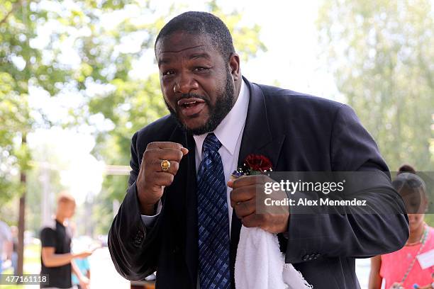 Boxer Riddick Bowe poses after the parade at the International Boxing Hall of Fame induction Weekend of Champions events on June 14, 2015 in...