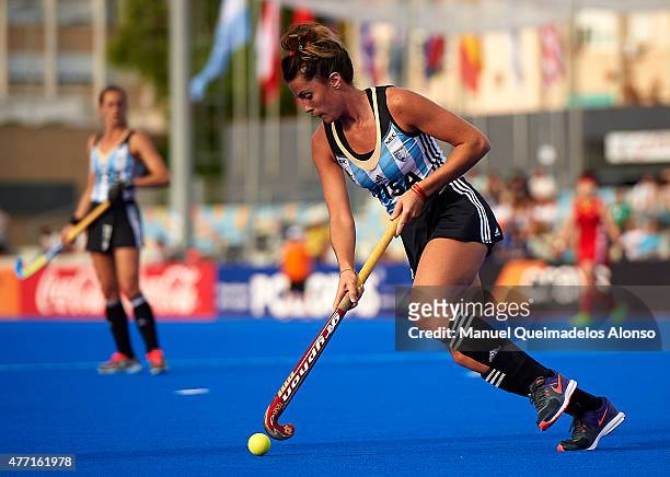 Agustina Albertario of Argentina runs with the ball during the match between China and Argentina at Polideportivo Virgen del Carmen during day four...