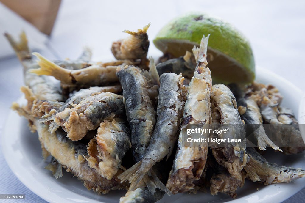Plate of fried sardines at taverna