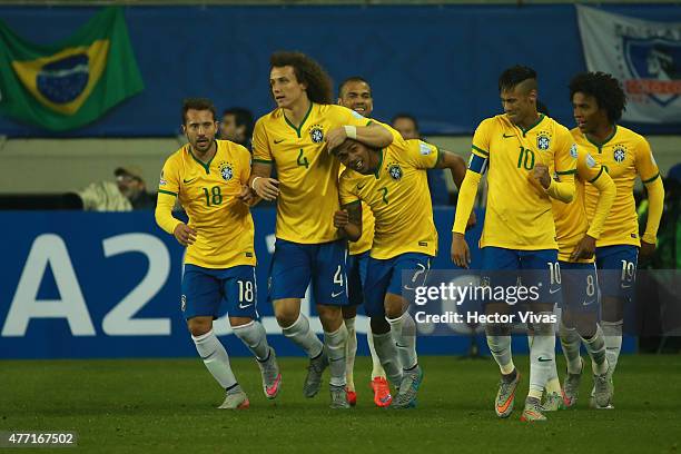 Douglas Costa of Brazil celebrates with teammates after scoring the second goal of his team during the 2015 Copa America Chile Group C match between...