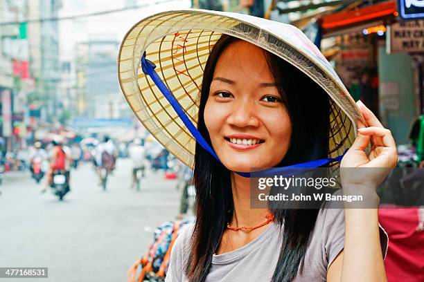 young woman in street, saigon - ho chi minh city stock-fotos und bilder