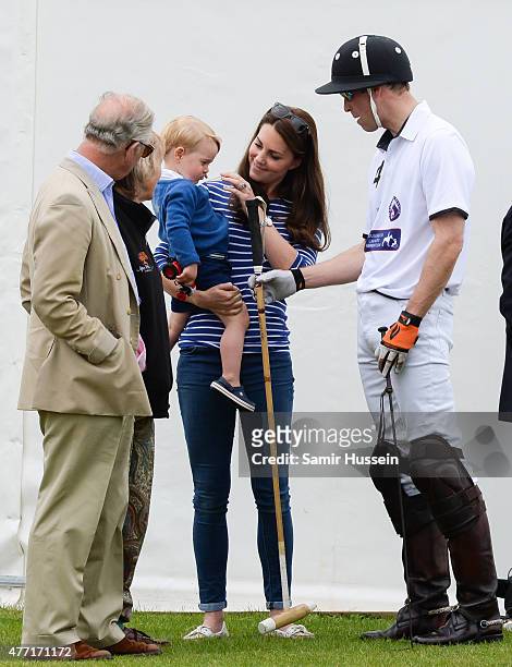 Prince Charles, Prince of Wales, Catherine, Duchess of Cambridge, Prince William, Duke of Cambridge and Prince George of Cambridge attend the Gigaset...