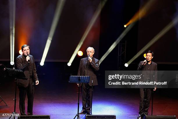 Pere Charles Troesch, Pere Jean-Michel Bardet and Joseph Dinh Nguyen Nguyen Perform during the Farewell Concert of 'les Pretres' at L'Olympia on June...