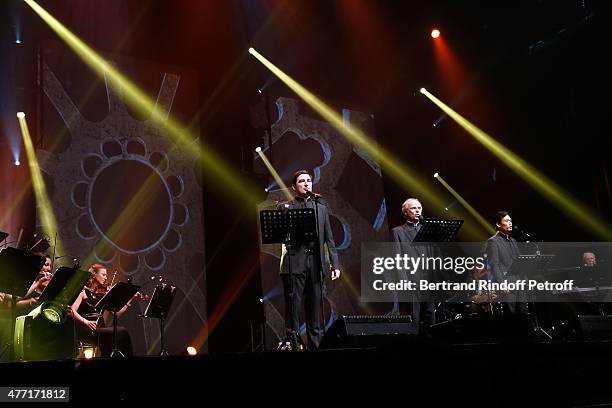 Pere Charles Troesch, Pere Jean-Michel Bardet and Joseph Dinh Nguyen Nguyen Perform during the Farewell Concert of 'les Pretres' at L'Olympia on June...