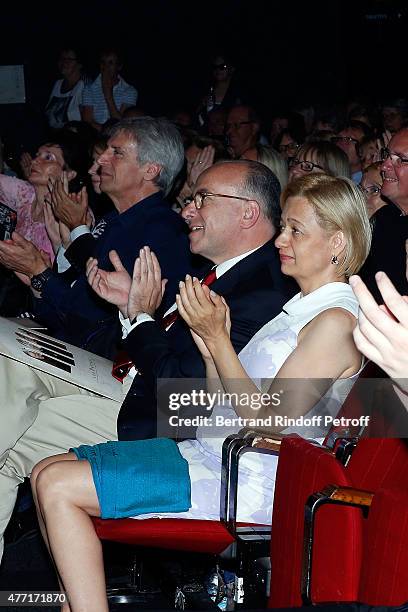 Ministre de l Interieur Bernard Cazeneuve and his wife attend the Farewell Concert of 'les Pretres' at L'Olympia on June 14, 2015 in Paris, France.