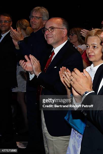 Singer Yves Duteil, Ministre de l Interieur Bernard Cazeneuve and his wife attend the Farewell Concert of 'les Pretres' at L'Olympia on June 14, 2015...