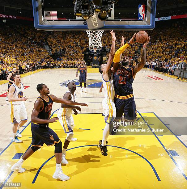 LeBron James of the Cleveland Cavaliers goes up to shoot against Shaun Livingston of the Golden State Warriors during Game Five of the 2015 NBA...