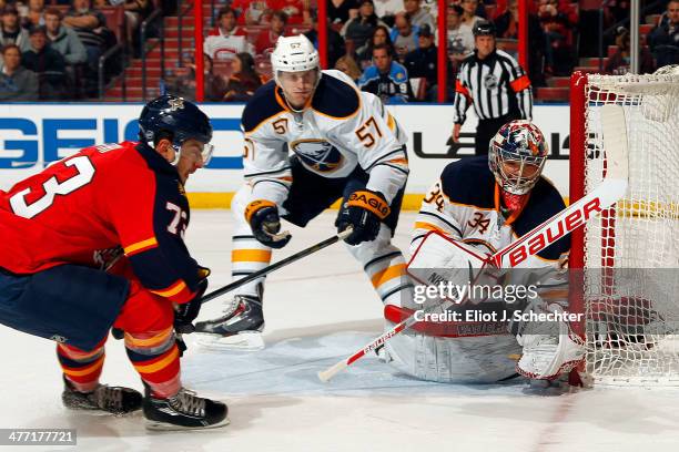 Goaltender Michal Neuvirth of the Buffalo Sabres defends the net against Brandon Pirri of the Florida Panthers at the BB&T Center on March 7, 2014 in...