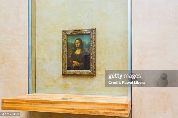 Mona Lisa paiting by Leonardo da Vinci at the Louvre Museum in Paris.