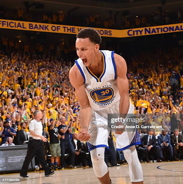 Stephen Curry of the Golden State Warriors reacts after winning the game against the Cleveland Cavaliers at the Oracle Arena During Game Five of the...