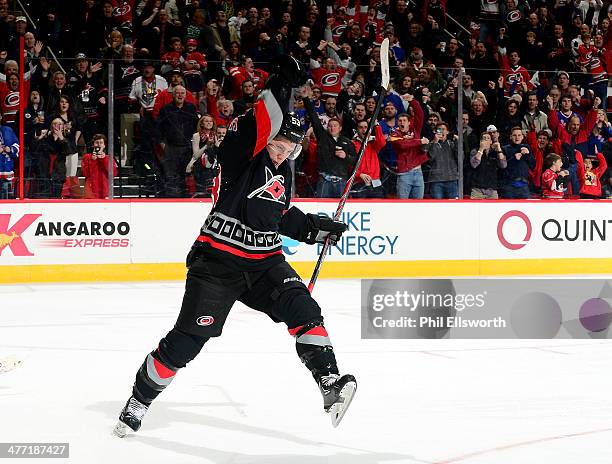 Jeff Skinner of the Carolina Hurricanes scores on a penalty shot in the third period of an NHL game against the New York Rangers on March 7, 2014 at...