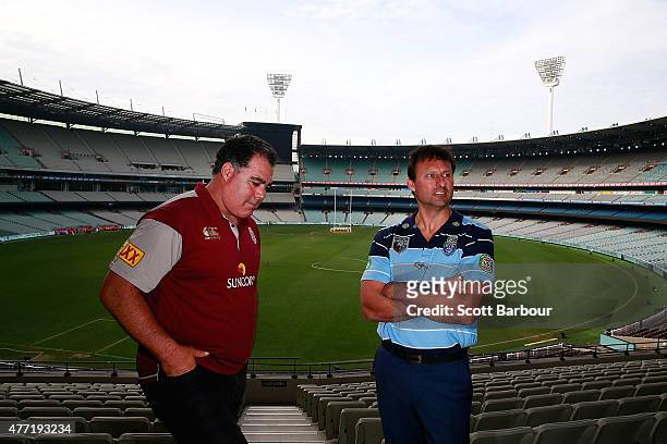 Maroons coach Mal Meninga and Blues coach Laurie Daley pose before game two of the State of Origin series between the New South Wales Blues and the...