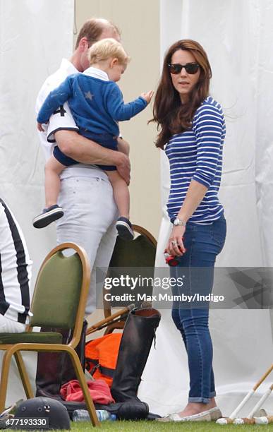 Prince William, Duke of Cambridge, Catherine, Duchess of Cambridge and Prince George of Cambridge attend the Gigaset Charity Polo Match at the...