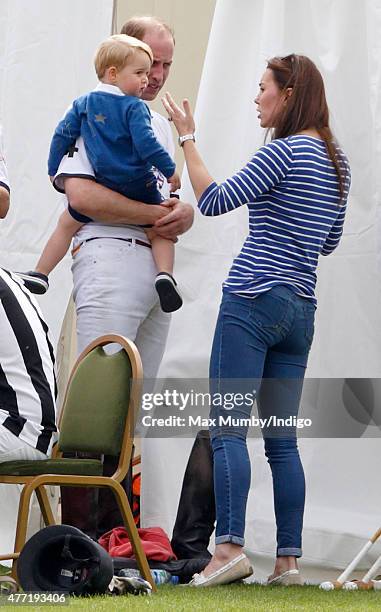 Prince William, Duke of Cambridge, Catherine, Duchess of Cambridge and Prince George of Cambridge attend the Gigaset Charity Polo Match at the...