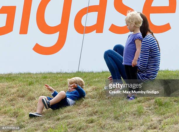 Catherine, Duchess of Cambridge, Prince George of Cambridge and Isla Phillips attend the Gigaset Charity Polo Match at the Beaufort Polo Club on June...