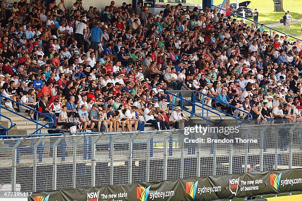 Crowd gather to watch on track activities during the 2014 Top Gear Festival Sydney at Sydney Motorsport Park on March 8, 2014 in Sydney, Australia.