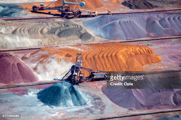 ore and conveyor belt aerial - mining natural resources stock pictures, royalty-free photos & images