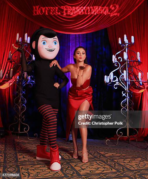 Actress Selena Gomez poses with her character Mavis for a portrait during the "Hotel Transylvania 2" photo shoot during Summer Of Sony Pictures...