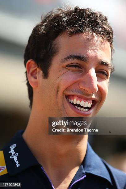 New hot lap record holder, Daniel Ricciardo of Infiniti Red Bull Racing shares a joke with a team member at the 2014 Top Gear Festival Sydney at...