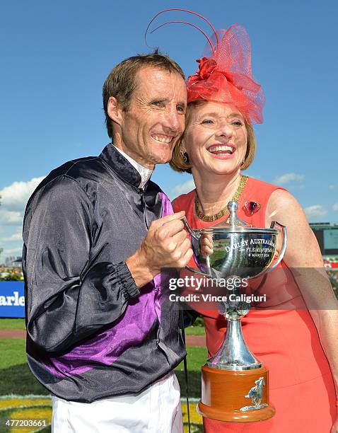 Damien Oliver and trainer Gai Waterhouse pose with the trophy after Fiorente won Race 7, the Darley Australian Cup during Australian Cup Day at...