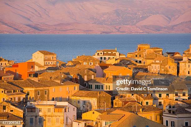 old town rooftops at sunset, corfu town, corfu - corfu town stock pictures, royalty-free photos & images