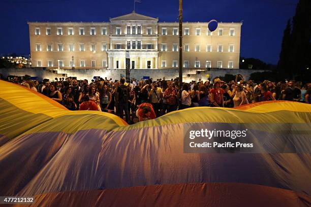 Large rainbow flag is carried passed the Greek Parliament at the 10th Athens Gay Pride Parade 2015.Several thousand people took part in Athens 10th...