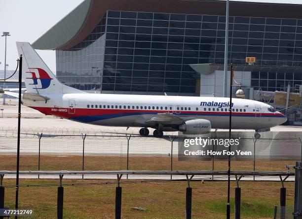 Malaysia Airline passenger jets are shown parked on the tarmac at the Kuala Lumpur International Airport on March 8, 2014 in Kuala Lumpur, Malaysia....