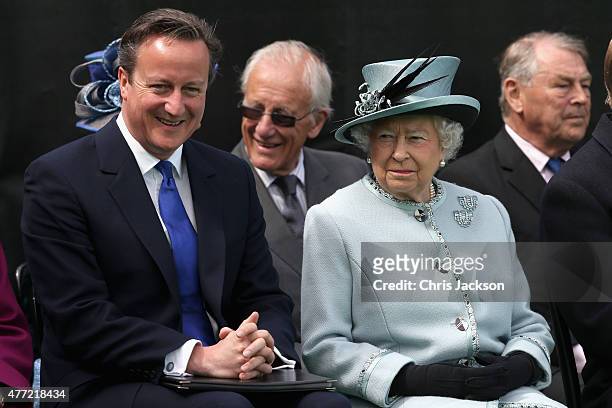 Queen Elizabeth II chats to British Prime Minister David Cameron at a Magna Carta 800th Anniversary Commemoration Event on June 15, 2015 in...