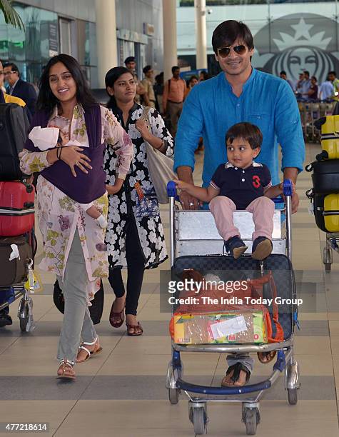 Vivek Oberoi spotted at Mumbai airport with his wife and daughter.