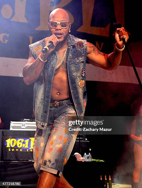 Flo Rida performs onstage during WBLU Summer Jam at Nikon at Jones Beach Theater on June 13, 2015 in Wantagh, New York.