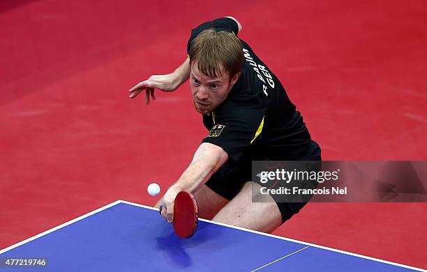 Patrick Baum of Germany competes in the Men's Team Table Tennis bronze medal match against Daniel Habesohn of Austria during day three of the Baku...