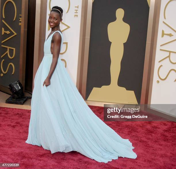 Actress Lupita Nyong'o arrives at the 86th Annual Academy Awards at Hollywood & Highland Center on March 2, 2014 in Hollywood, California.