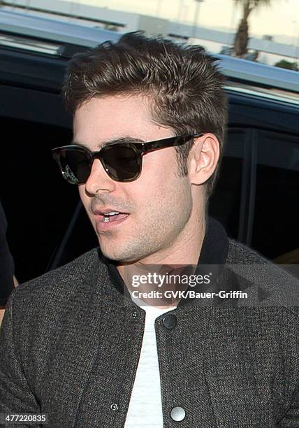 Zac Efron is seen at LAX on March 07, 2014 in Los Angeles, California.