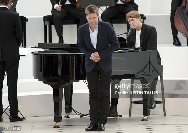 Burberry chief creative officer and chief executive officer Christopher Bailey takes a bow after the British design house Burberry Prorsum catwalk...